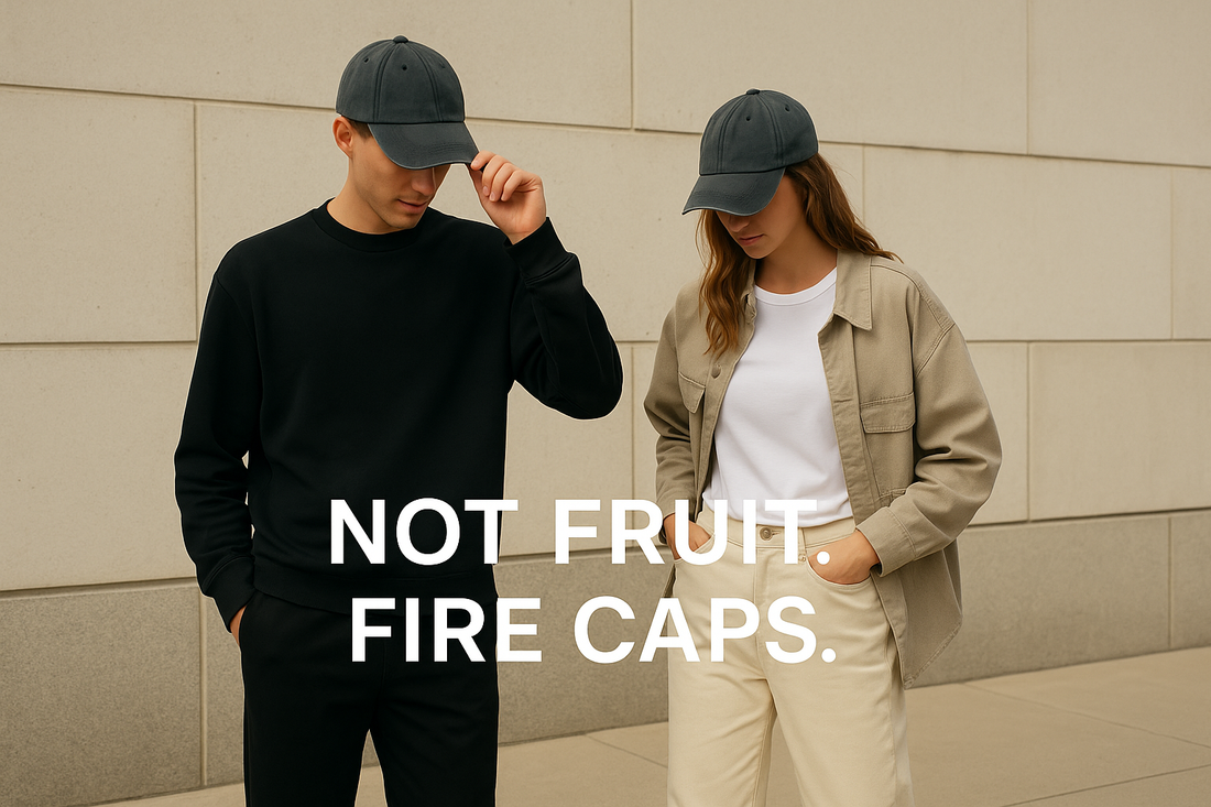 Two people wearing dark gray caps with text overlay on a beige wall background.